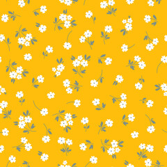 Yellow seamless pattern with white flowers.