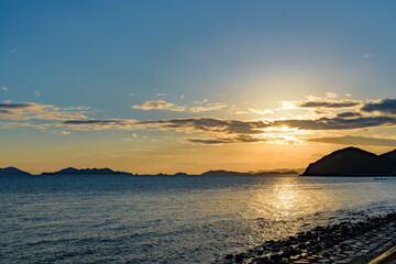Fototapeta premium Sunset in the Seto Inland Sea, looking toward the Kasaoka Islands from Yorishima-cho