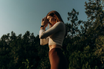 Woman gets pleasure from herself and from summer. Natural beauty