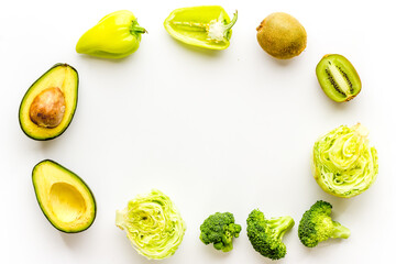 Spinach avocado broccoli and variety green vegetables. Protein vegetarian food background