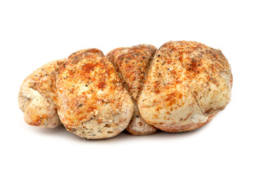 The cooked chicken breast in spices