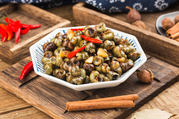Chinese food: Stir fried snails with thirteen spices