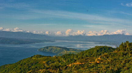 The beauty of Lake Toba which is a caldera lake comes from an ancient volcanic eruption and is the largest volcanic lake in the world. View from geosite hutaginjang. North Sumatra, Indonesia