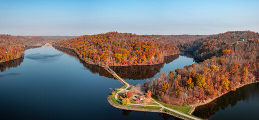 Rising sun casts warm light on the park at Cheat Lake near Morgantown West Virginia on a beautiful...