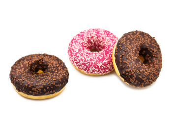 Appetizing donuts with frosting isolated on a white background.	