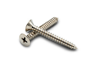 close image of steel tapping screws, metal screw, iron screw, chrome screw, screws in the background, wood screw, path On a white background, a screw is isolated.
