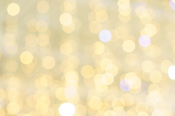 Christmas light background. Holiday glowing background. Defocused background with blinking stars....