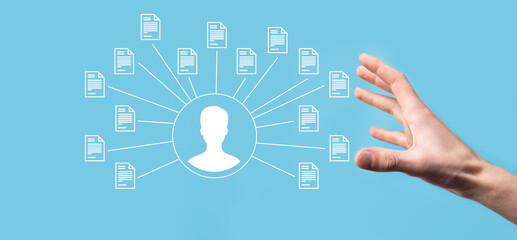 Document Management System DMS .Businessman hold user and document icon.Software for archiving, searching and managing corporate files and information.Internet Technology Concept.Digital security.