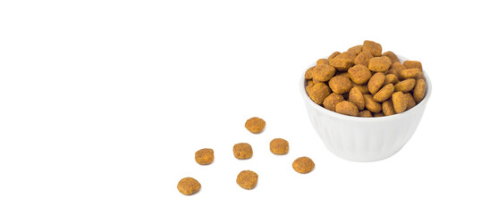 Pet food on a white background. Food is scattered around.