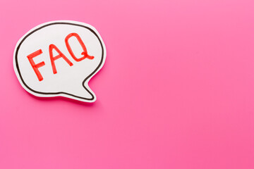 Faq - frequently asked questions - text on paper bubble, top view