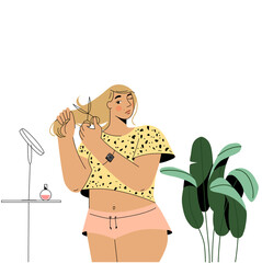 The girl cuts her hair.