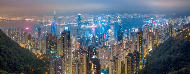 Aerial panorama shot a Hong Kong Corporate Buildings streets at night time. Hi Res big panorama.