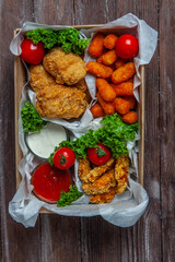 Business lunch in paper container ready for delivery. Top view. Office Lunch boxes with food ready to go. Food takes away. 