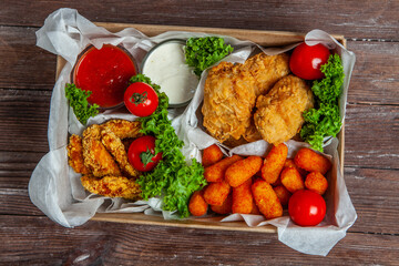Business lunch in paper container ready for delivery. Top view. Office Lunch boxes with food ready to go. Food takes away. 