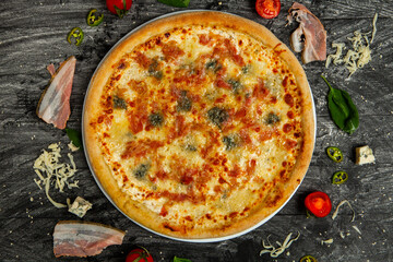 Pizza carbonara with mozzarella, bacon, gorgonzola cheese, parmesan cheese