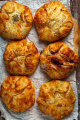 Traditional fried pies from Romania with potatoes, cheese and cabbage. Romanian food.