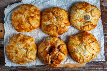 Traditional fried pies from Romania with potatoes, cheese and cabbage. Romanian food.