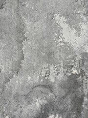 Texture of concrete wall. Shabby gray stone wall with white putty. Close up.