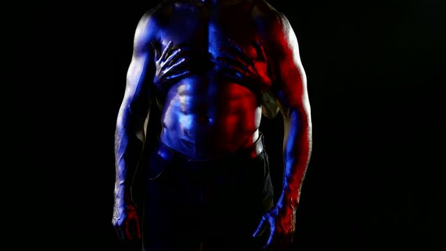 erotic fantasy, sexual male torso covered shiny dye, female hands are stroking him