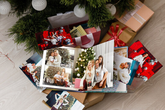 Photo collage of nine images with winter concept. Holiday season. open photo book with christmas photos