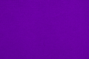 Purplevelvet fabric texture used as background. Empty purple fabric background of soft and smooth textile material. There is space for text..