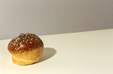 Assortment of small round brioche buns with homemade seeds