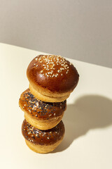 Assortment of small round brioche buns with homemade seeds