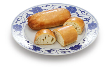 fried steamed silver thread roll; silver thread roll is a type of chinese bun; steamed bun from shandong province bun with hand-drawn dough threads folded over.

