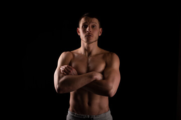 Naklejka premium Sportsman Hands Crossed Topless. Healthy Life, Medical protection, Sports Concept