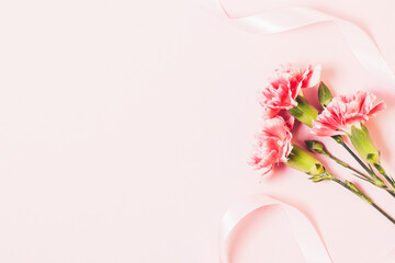 Floral pink background with fresh flowers
