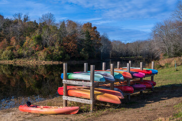 Colorful Canoes by a Lake