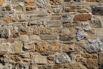 Massive high walls of an old medieval castle