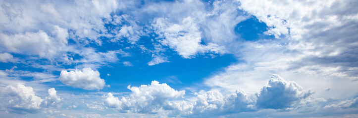 Naklejka na ściany i meble Panoramic view blue sky and white clouds