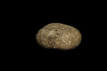 Macro mineral stone Pyrite on a black background