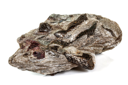 Macro stone Garnet mineral in rock on a white background