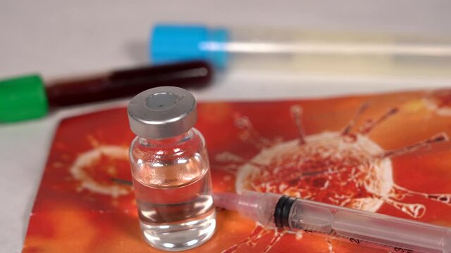 Generic vial without logo of vaccine against Covid-19 Coronavirus epidemic - vaccination and syringe