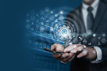 Businessman on the phone updates the system on a blue background.