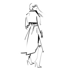 Tall blonde woman looking fashionable in trench coat and thigh high boots