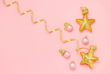 Christmas and New Year festive background with Christmas balls and golden stars, copy space.