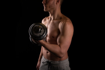 Fototapeta na wymiar Man Pumping Biceps with Dumbbell Topless. Sprotsman Doing Traning on Biceps Muscles. Gym, Lifting Sport Concept. Close Up