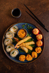 Sushi Set, Sashimi, Rolls Set on Table. Asian Cuisine. Healthy Food. Wakame Salat and Sushi Sticks