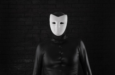 funny mime in a white mask on a black background