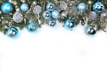 Christmas composition and concept of the new year 2022, frame with beautiful holiday decorations on a light background, postcard, winter banner for the screen with place for text, layout for design