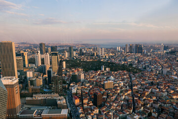 Fototapeta na wymiar Top view of the evening modern Istanbul from the Sapphire building on the background of the Bosphorus