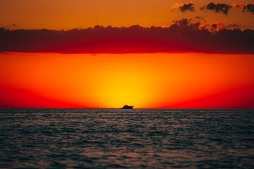 Fototapeta premium Crossing the sunset