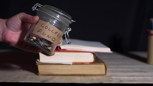 Student checking savings in college fund 