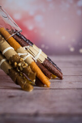 Fruit marshmallow and paste on a colored background with nuts