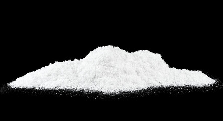 Pile of snow on a black background. Snow hills. Pile of snow crystals.