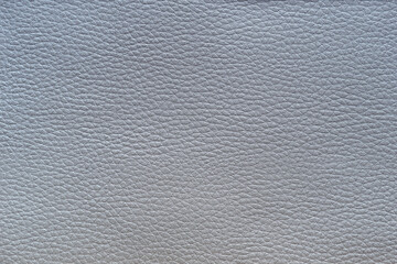 Artificial leather texture in metallic silver, background.