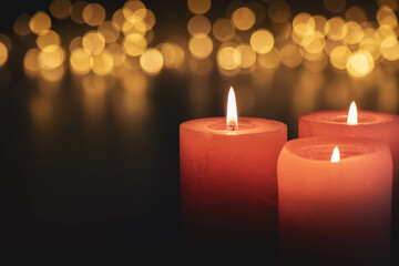 Candle with golden Lights at Christmas time
